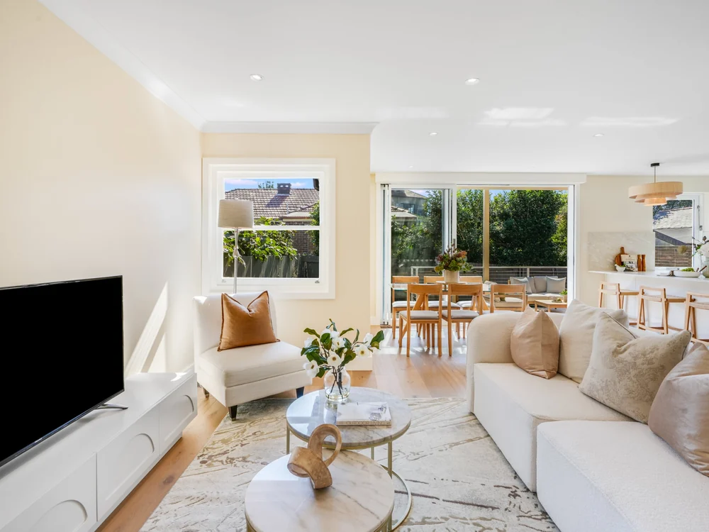 Open-plan living, dining and kitchen, with sliding doors to the rear deck, 27 Forsyth Street