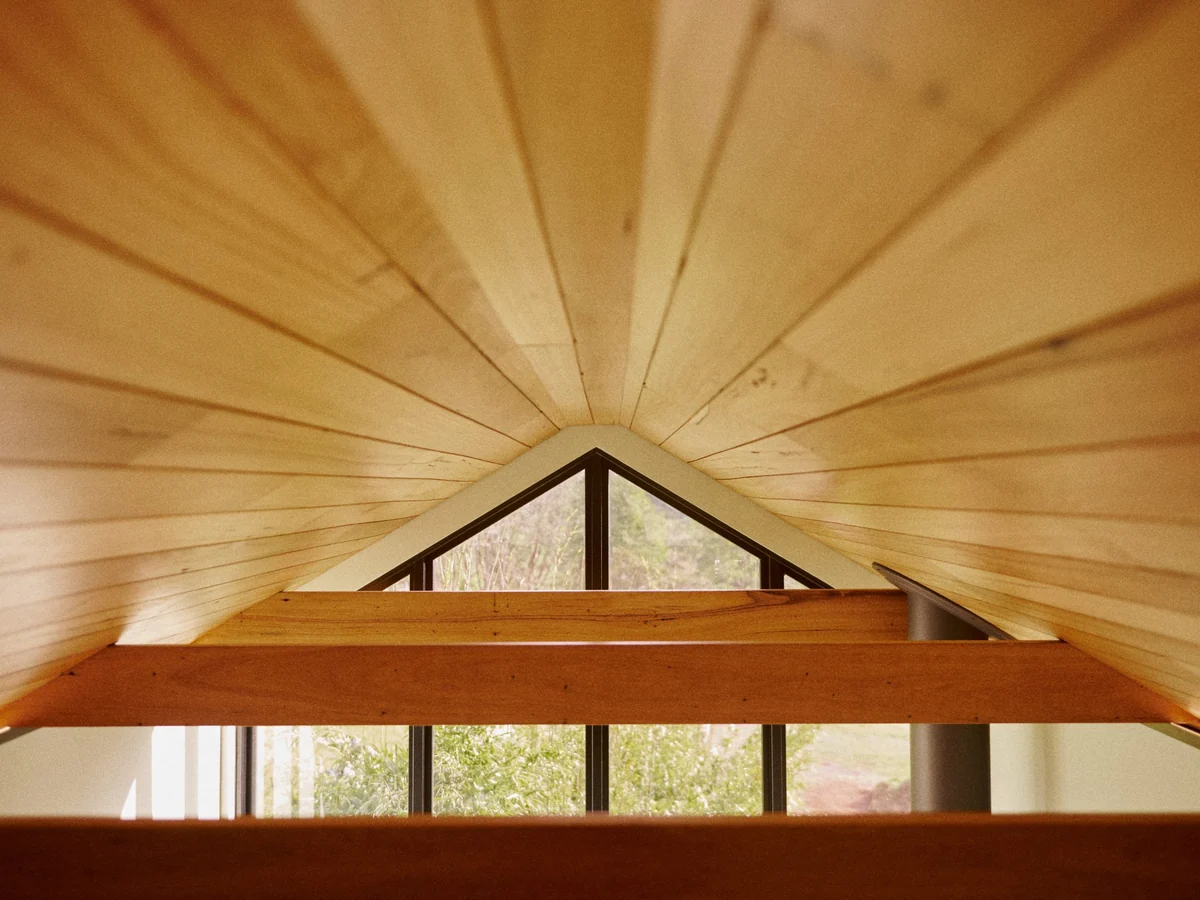 Timber-lined gable ceiling and exposed beams